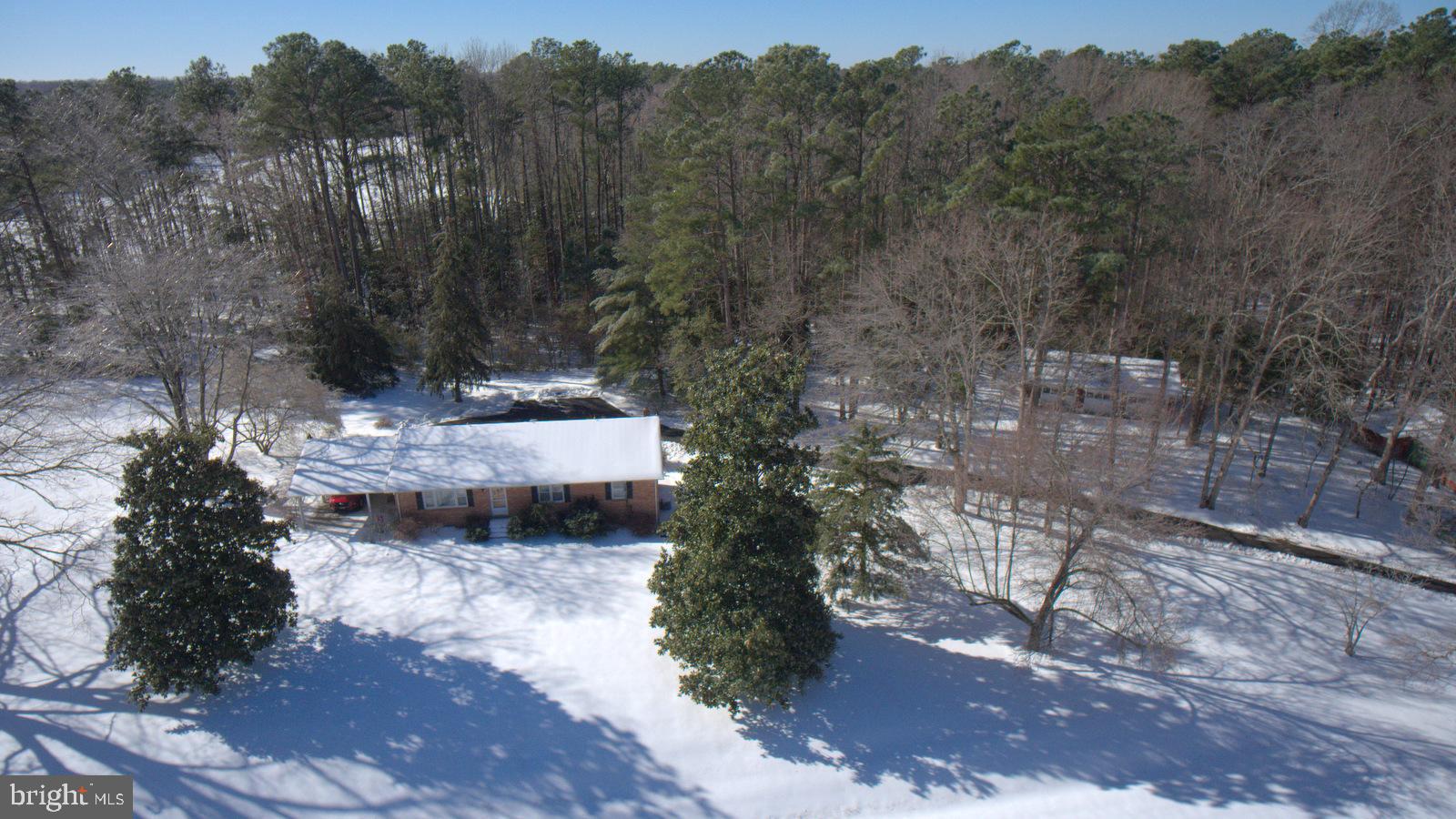 43641 Redmond Road Leonardtown, MD 20650 - Photo 3 of 15 a view of a street with lots of trees