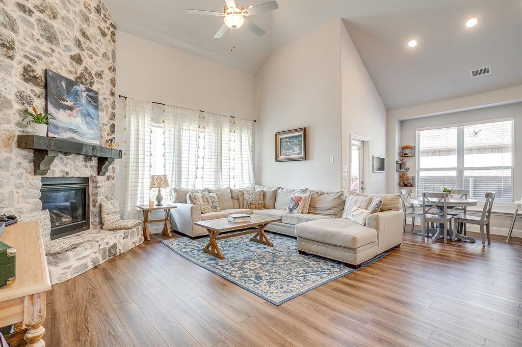 10371 Trail Ridge Drive Fort Worth, TX 76126 - Photo 12 of 35 a living room with furniture and a fireplace