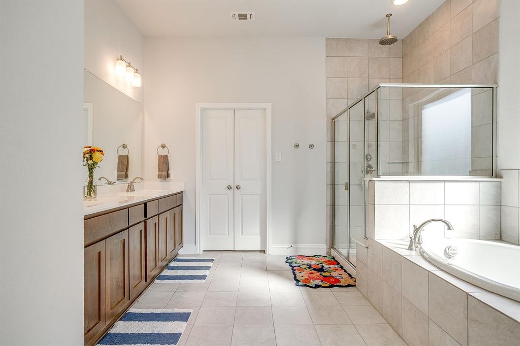 10371 Trail Ridge Drive Fort Worth, TX 76126 - Photo 16 of 35 a hallway with toys and white cabinets