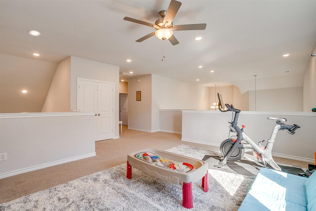 10371 Trail Ridge Drive Fort Worth, TX 76126 - Photo 25 of 35 a view of a room with gym equipment