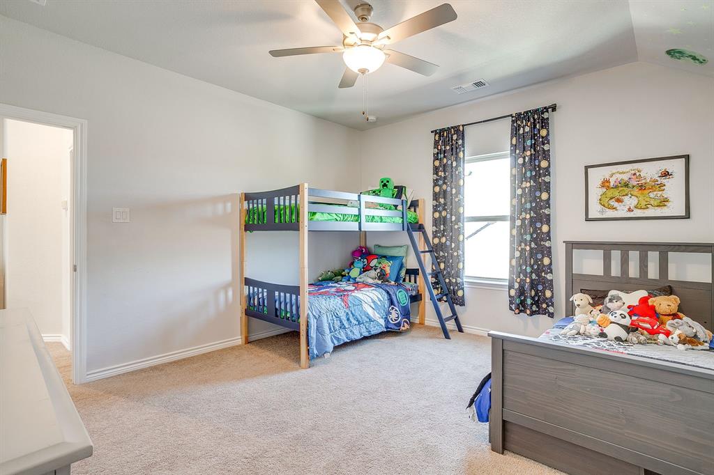 10371 Trail Ridge Drive Fort Worth, TX 76126 - Photo 30 of 35 a children room with toys and ceiling fan