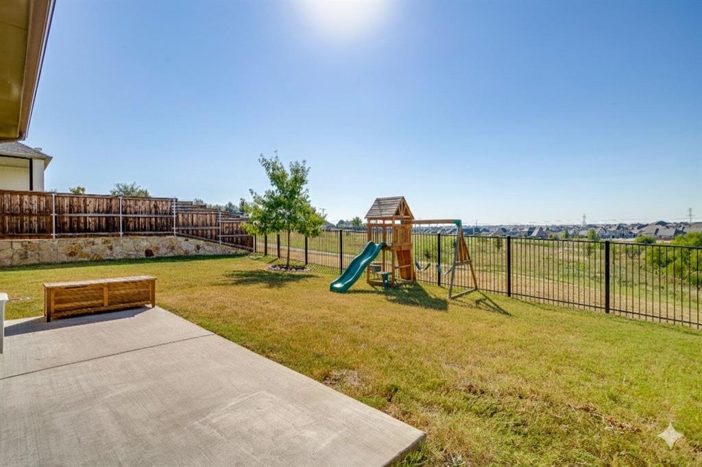 10371 Trail Ridge Drive Fort Worth, TX 76126 - Photo 3 of 35 a view of a park with swings