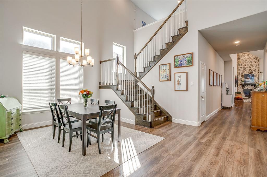 10371 Trail Ridge Drive Fort Worth, TX 76126 - Photo 4 of 35 a view of a dining room with furniture and wooden floor