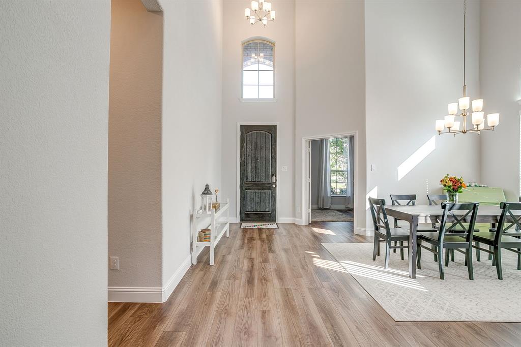 10371 Trail Ridge Drive Fort Worth, TX 76126 - Photo 5 of 35 a view of a dining room with furniture and wooden floor