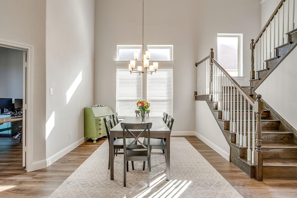 10371 Trail Ridge Drive Fort Worth, TX 76126 - Photo 6 of 35 a view of a dining room with furniture and a window