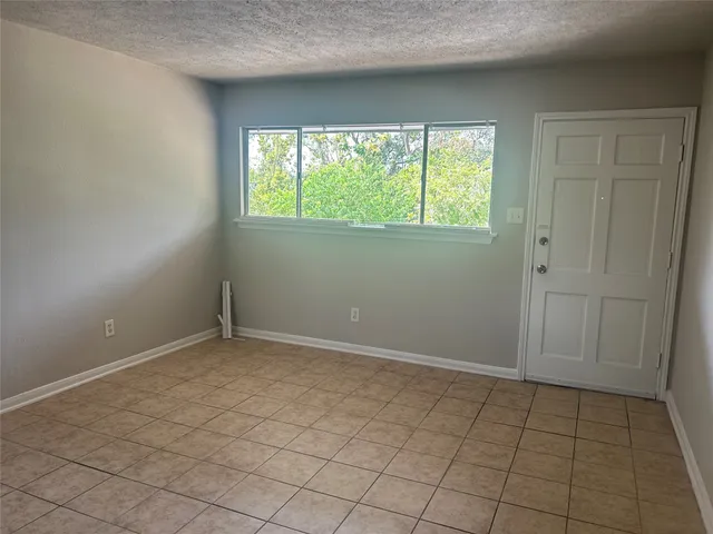 a utility room with closet dryer and washer