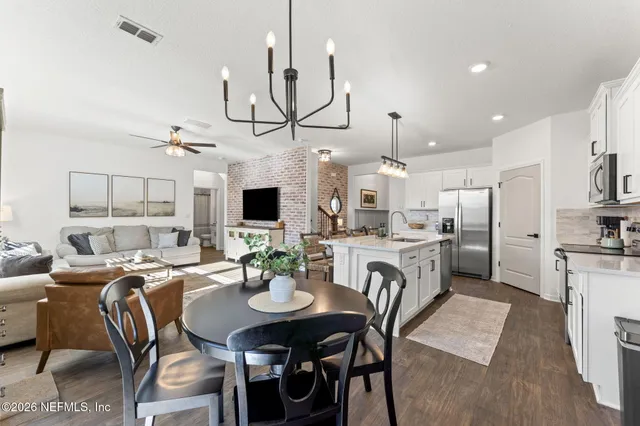 an aerial view of a house with outdoor space