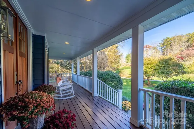 a view of a porch with wooden floor and outdoor space