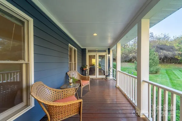 a view of a porch with a garden
