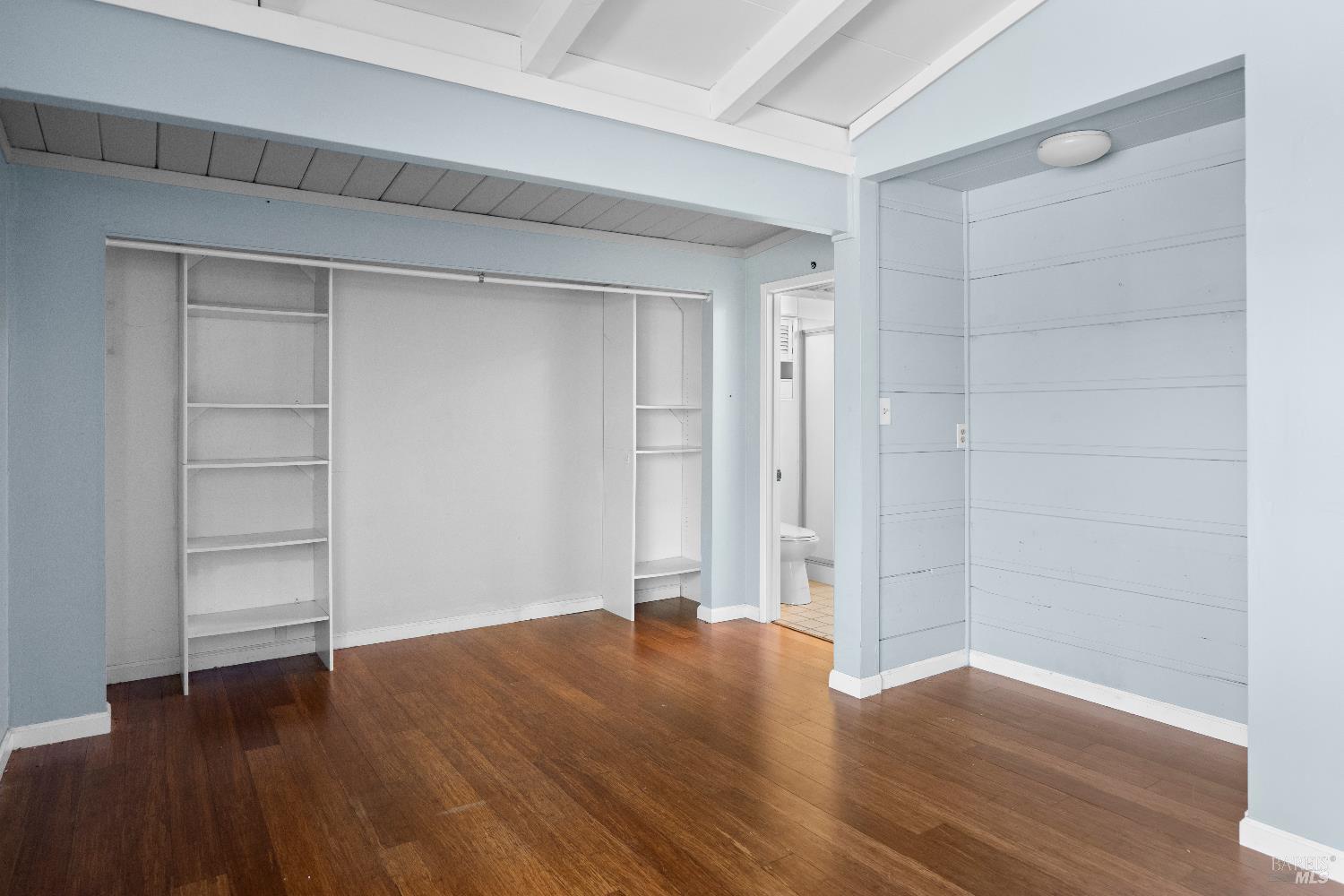 1219 Janet Way Santa Rosa, CA 95405 - Photo 8 of 22 a view of an empty room with wooden floor