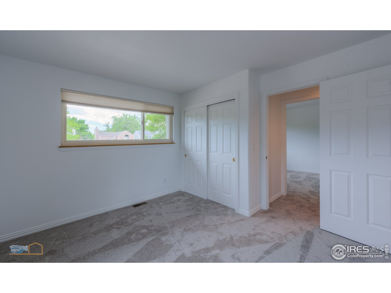 5933 Wellington Road Boulder, CO 80301 - Photo 18 of 39 a open hall with a ceiling fan