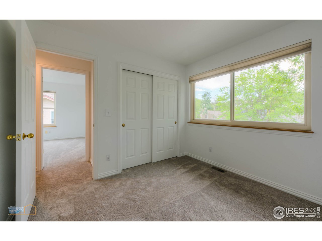 5933 Wellington Road Boulder, CO 80301 - Photo 19 of 39 a view interior of a house wooden floor and windows