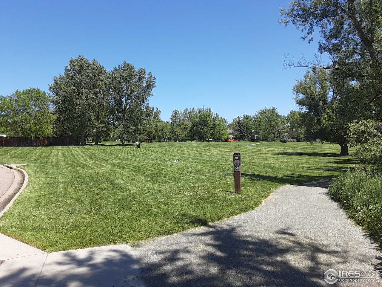 5933 Wellington Road Boulder, CO 80301 - Photo 33 of 39 a view of a golf course with a lake