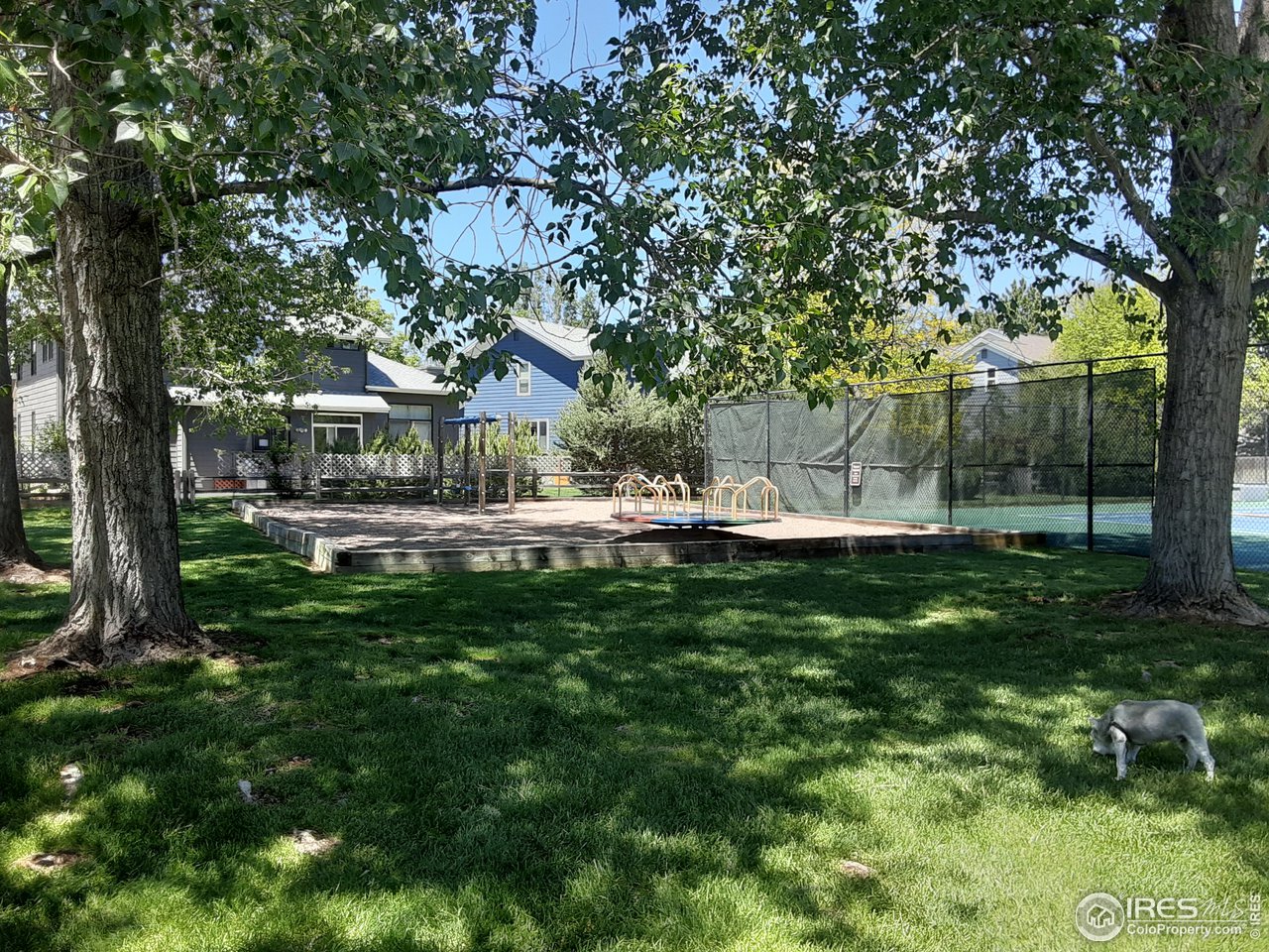 5933 Wellington Road Boulder, CO 80301 - Photo 36 of 39 a view of a house with a yard