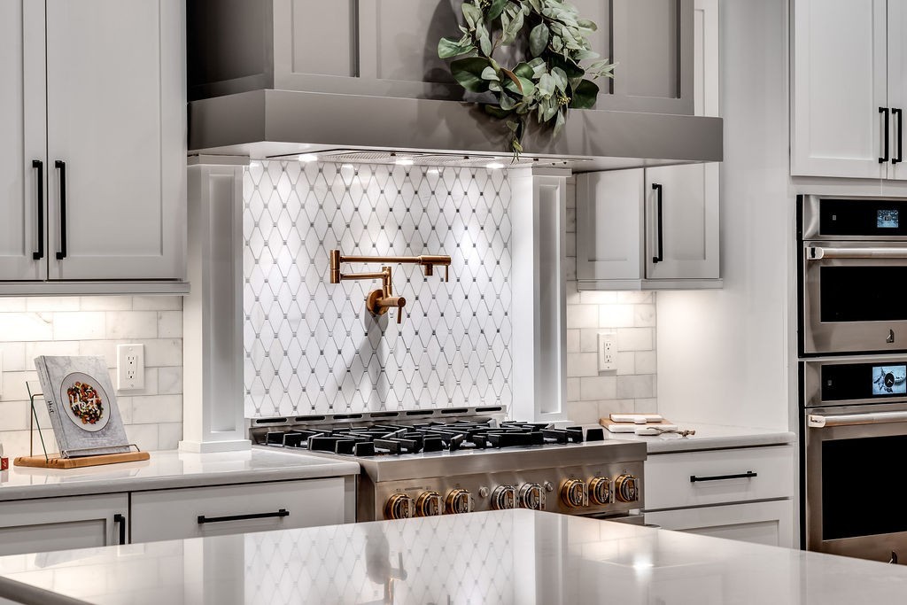 108 Alpine Court Franklin, TN 37069 - Photo 14 of 42 a kitchen with stainless steel appliances granite countertop a refrigerator and a stove