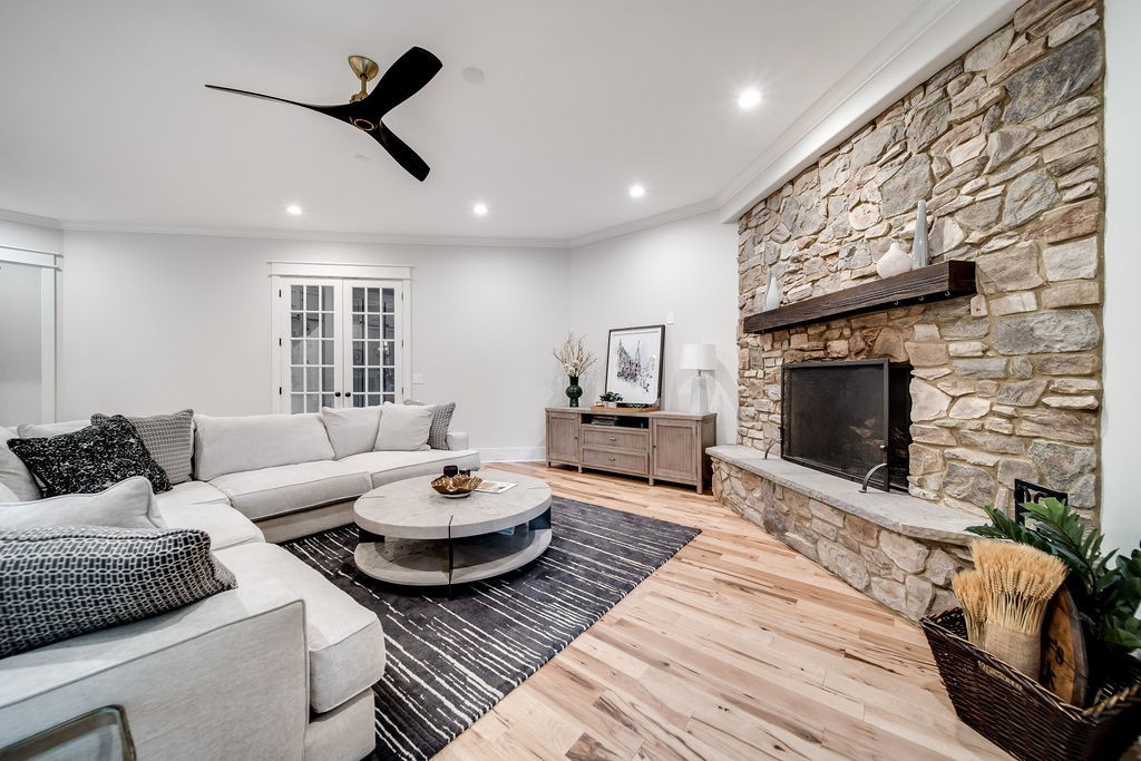 108 Alpine Court Franklin, TN 37069 - Photo 20 of 42 a living room with furniture a fireplace and a flat screen tv