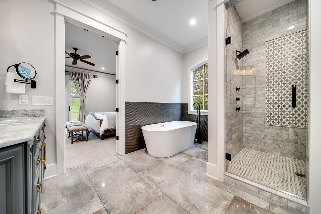 108 Alpine Court Franklin, TN 37069 - Photo 22 of 42 a bathroom with a granite countertop sink a toilet and shower