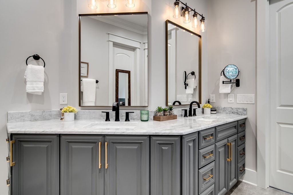 108 Alpine Court Franklin, TN 37069 - Photo 24 of 42 a bathroom with a granite countertop sink and a mirror