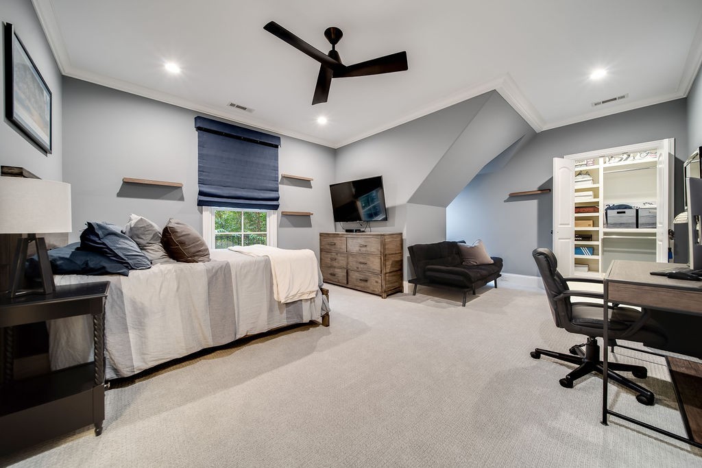 108 Alpine Court Franklin, TN 37069 - Photo 30 of 42 a living room with furniture and a flat screen tv