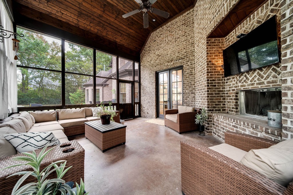 108 Alpine Court Franklin, TN 37069 - Photo 36 of 42 a living room with furniture fireplace and flat screen tv
