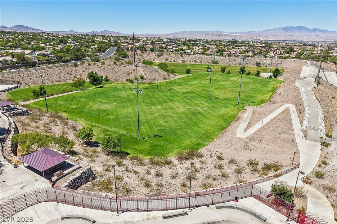 1176 Butternut Ranch Court Henderson, NV 89052 - Photo 56 of 60 Green parkland and walking paths weave through this community-focused outdoor space.