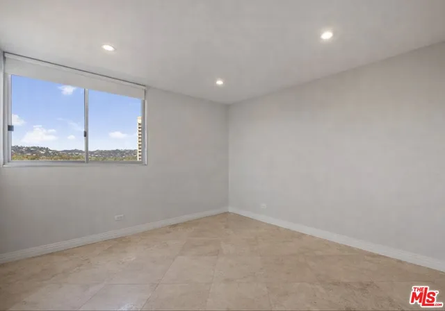 a view of a balcony with city view