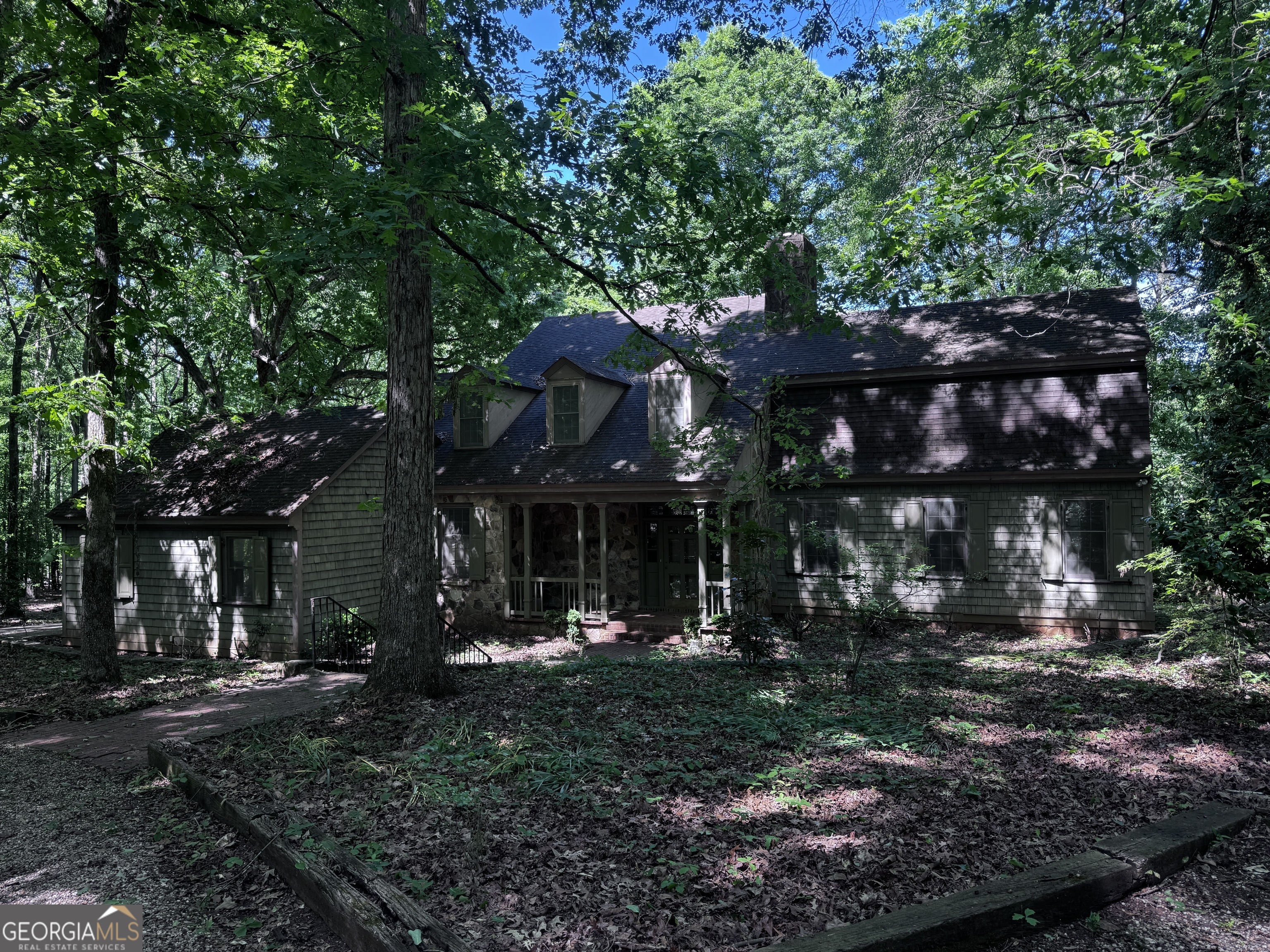 1980 Kilgore Road Griffin, GA 30223 - Photo 10 of 19 a view of a house that has a tree in front of it