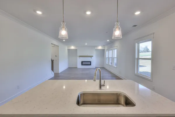 a view of an empty room and window