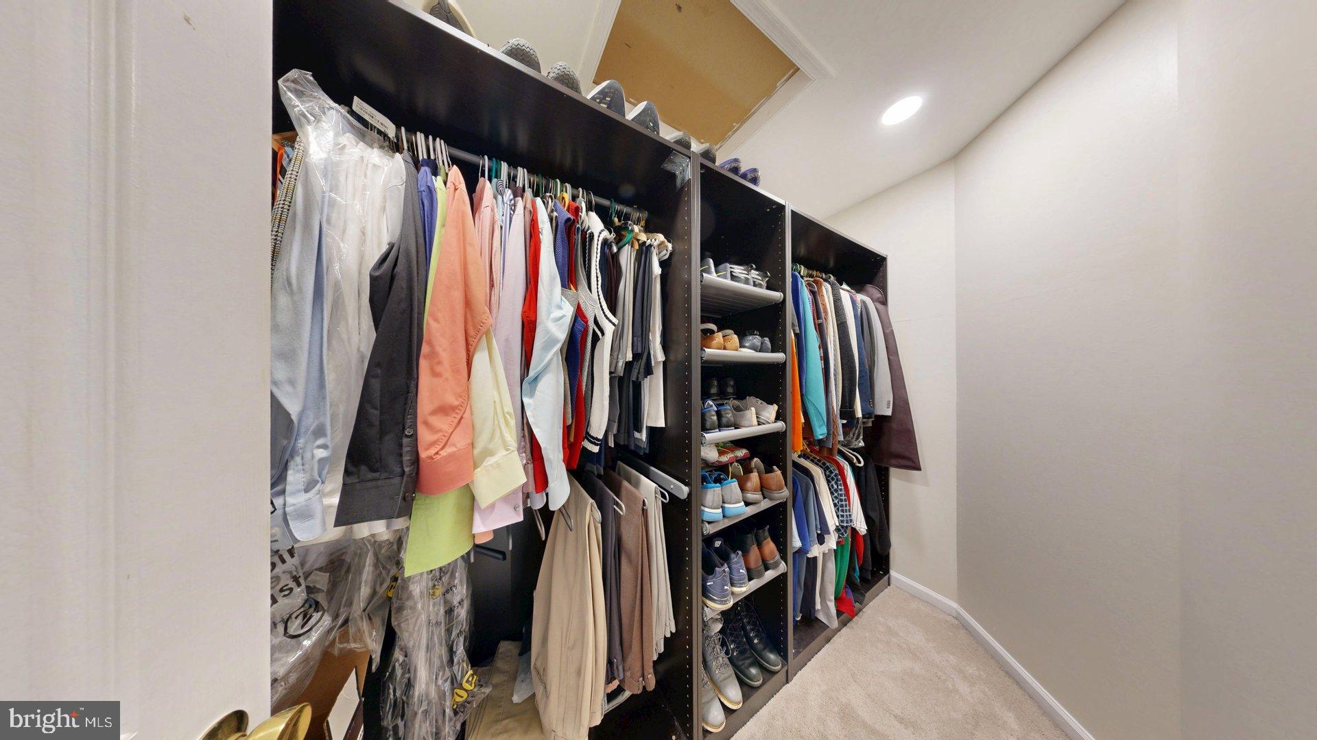 11901 Rustic Farm Court Germantown, MD 20874 - Photo 78 of 134 Stylish closet with organized attire.