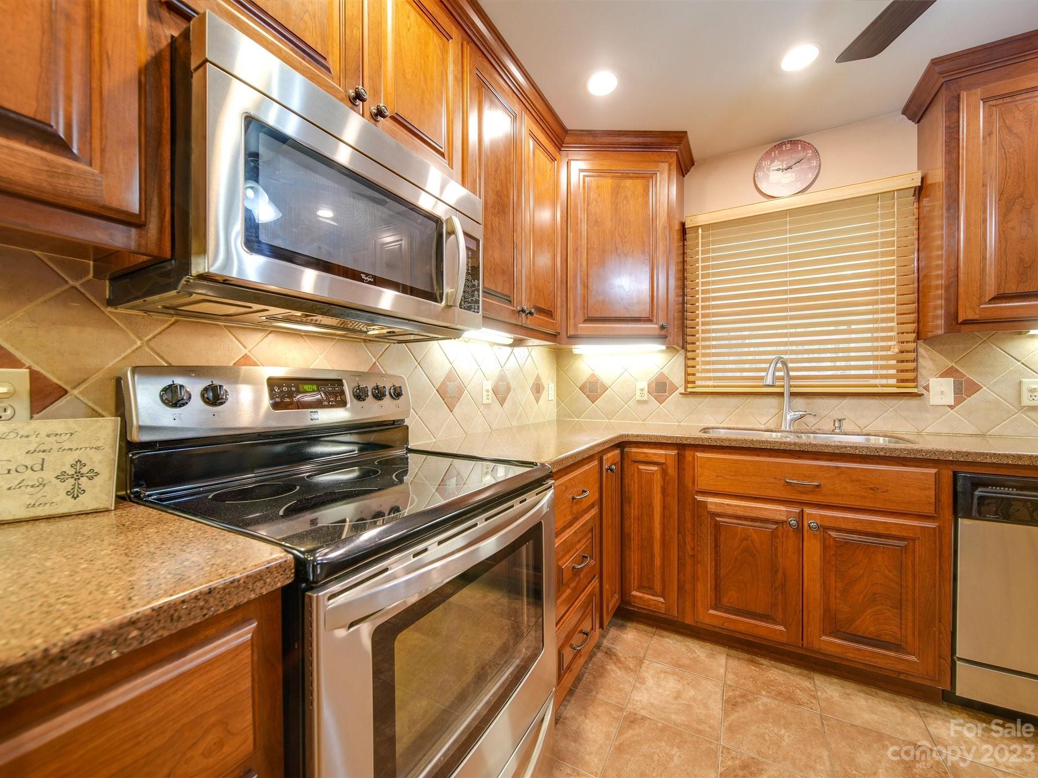 3403 Stack Road Monroe, NC 28112 - Photo 12 of 31 a kitchen that has a stove and a sink