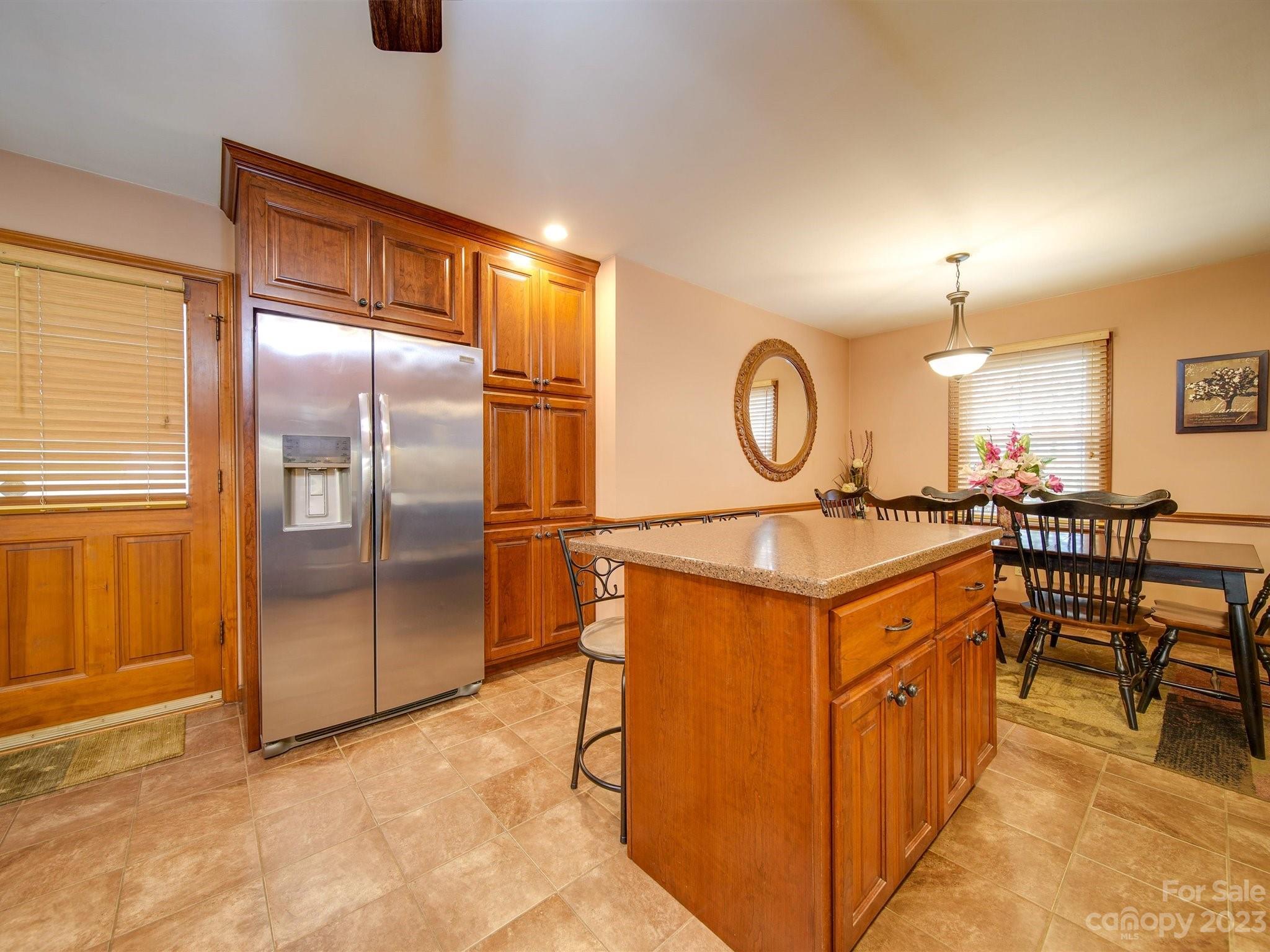 3403 Stack Road Monroe, NC 28112 - Photo 16 of 31 a kitchen with stainless steel appliances granite countertop a stove a sink dishwasher and a refrigerator