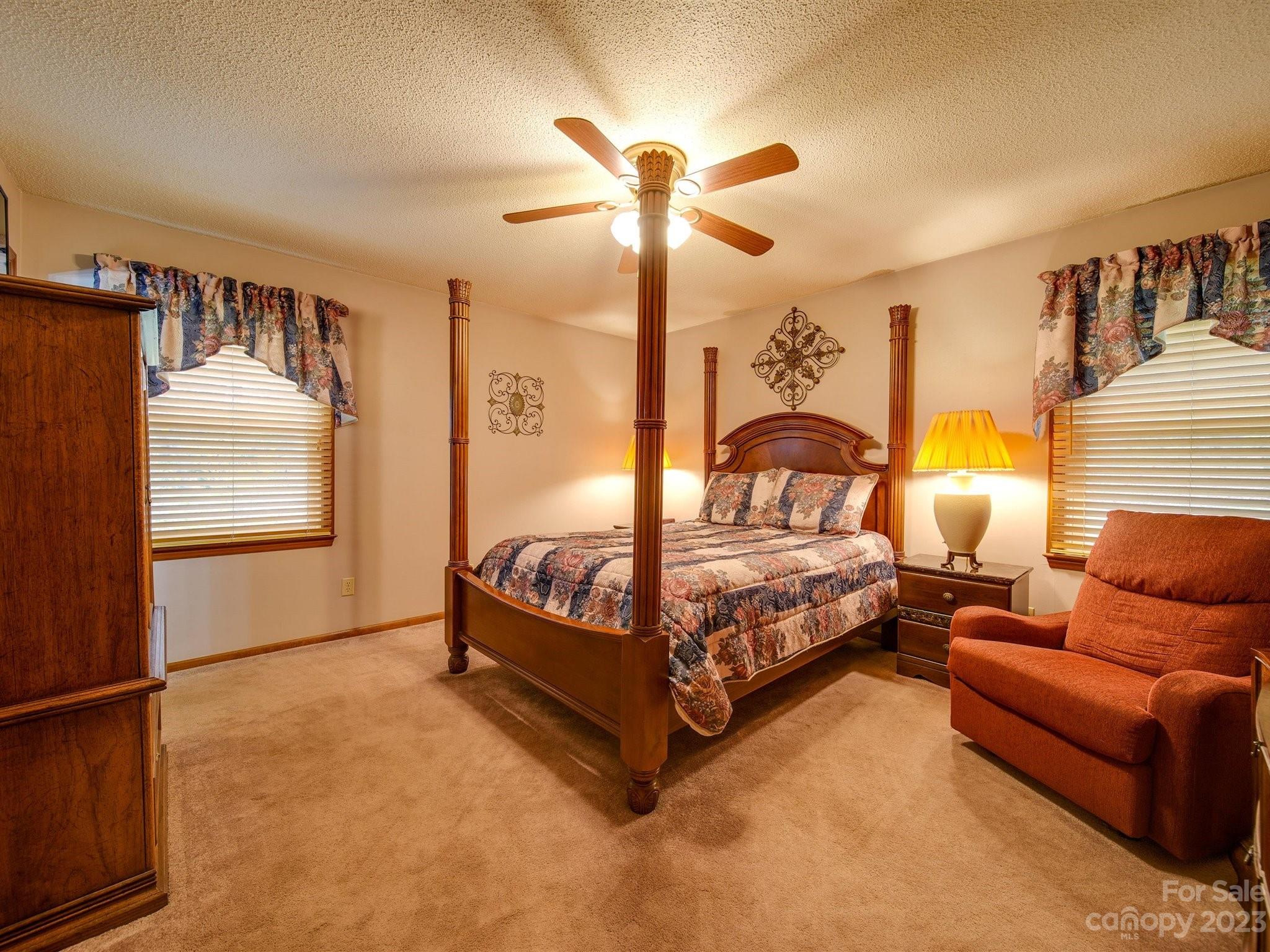 3403 Stack Road Monroe, NC 28112 - Photo 17 of 31 a bedroom with a bed couch and window
