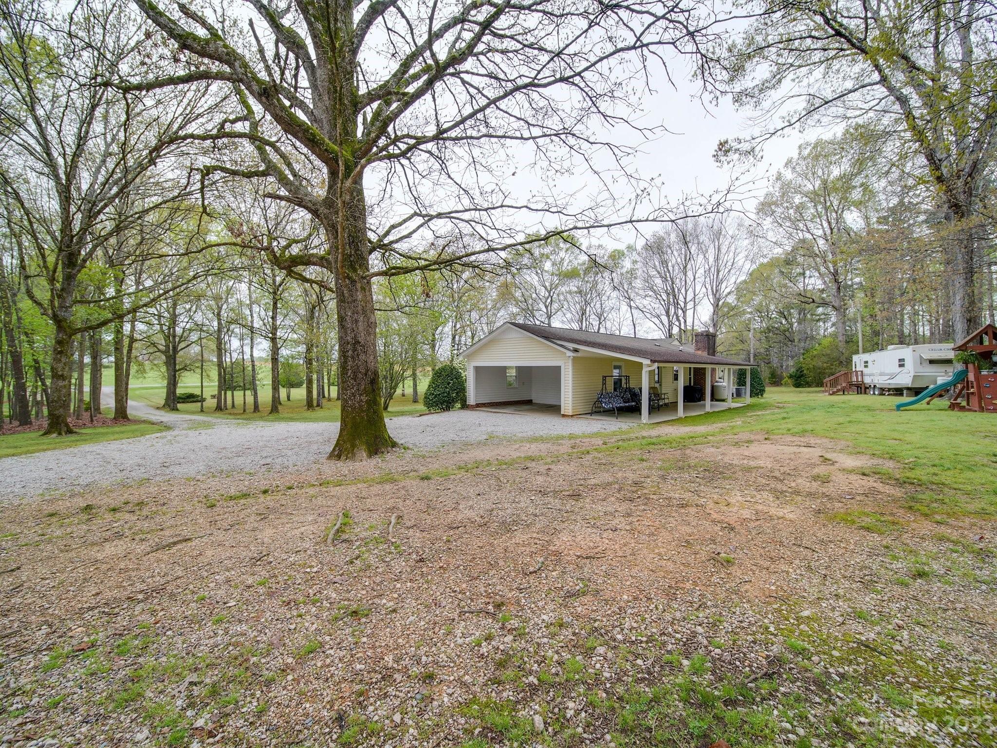 3403 Stack Road Monroe, NC 28112 - Photo 24 of 31 a front view of house with yard and green space
