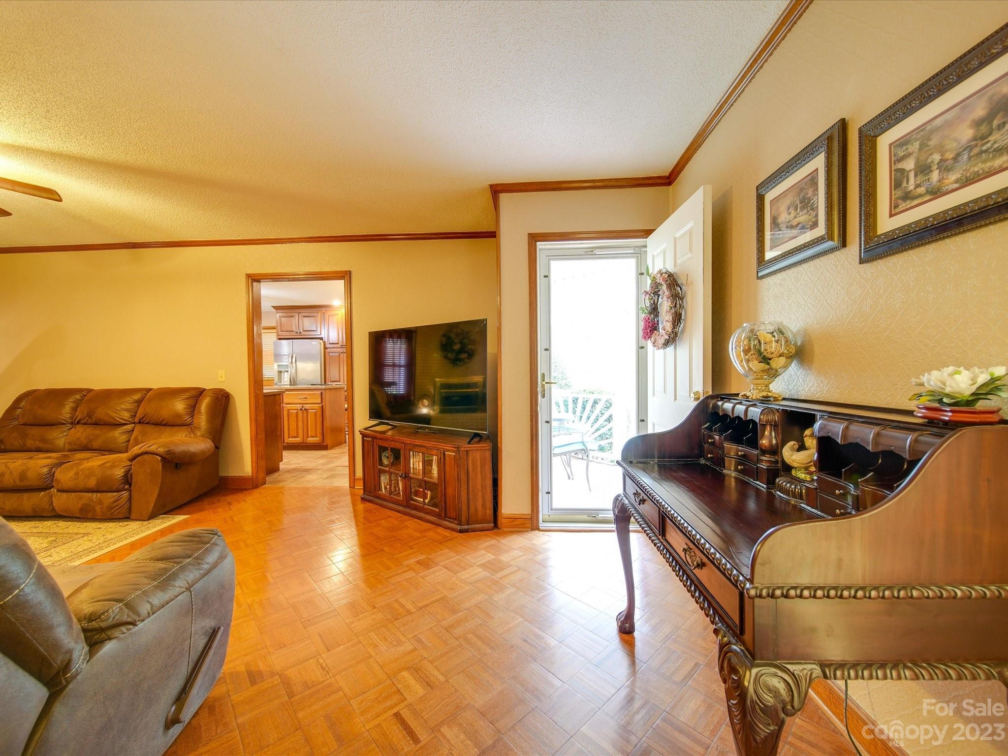 3403 Stack Road Monroe, NC 28112 - Photo 6 of 31 a living room with furniture and a flat screen tv