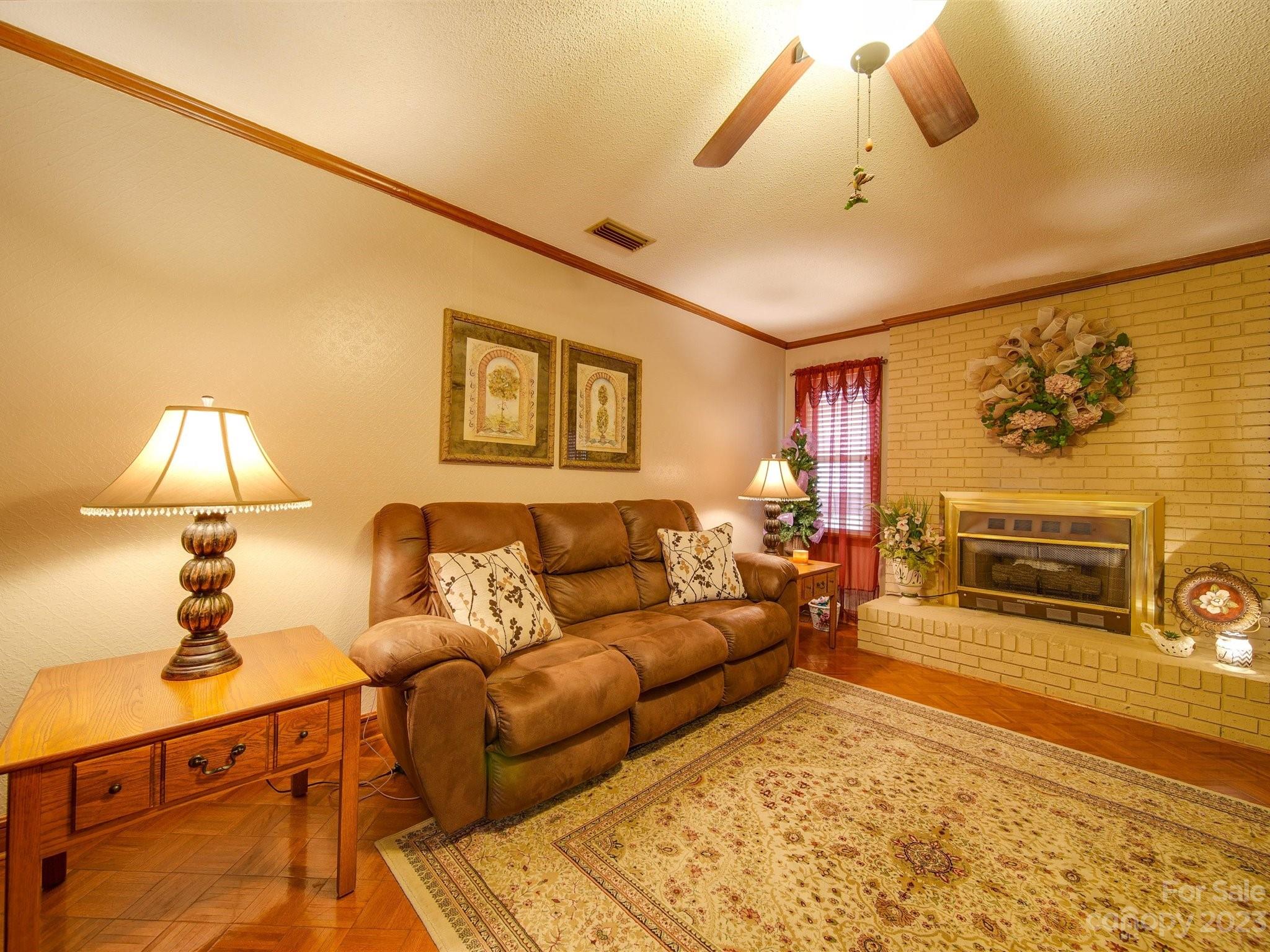 3403 Stack Road Monroe, NC 28112 - Photo 8 of 31 a living room with furniture and a fireplace
