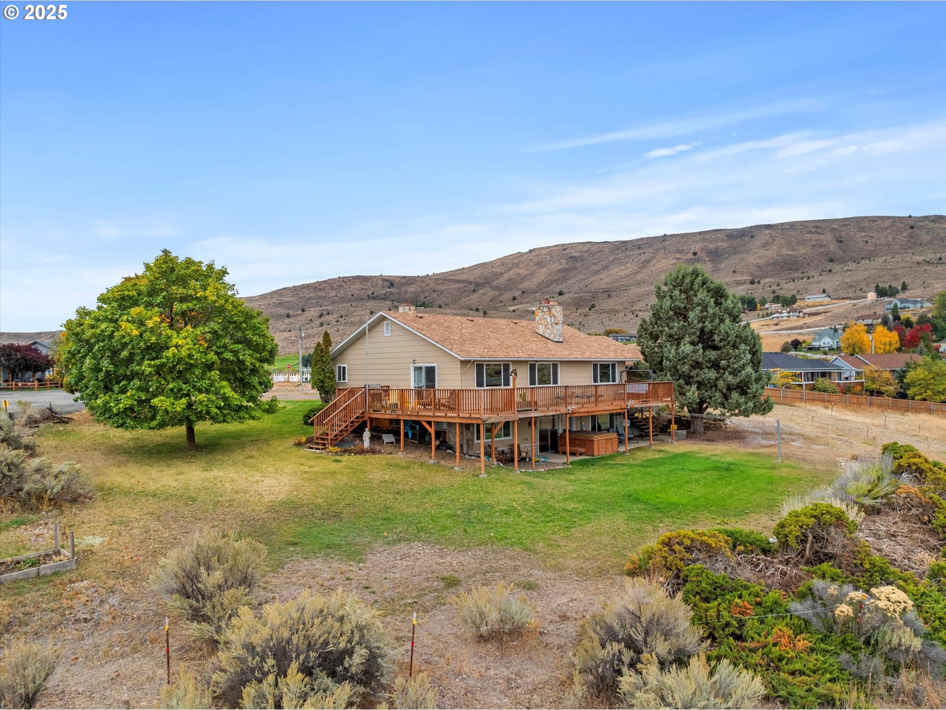 1025 17th Street Baker City, OR 97814 - Photo 2 of 48 a view of a house with garden