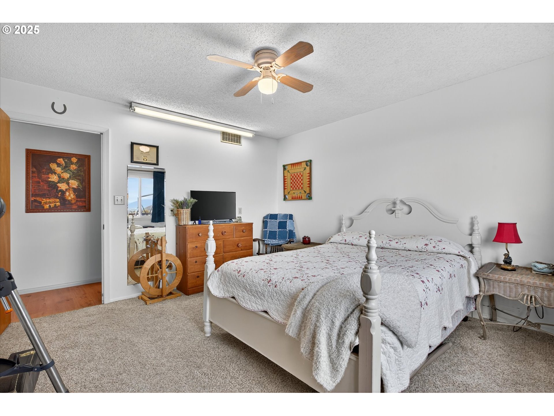 1025 17th Street Baker City, OR 97814 - Photo 34 of 48 a bed room with a bed and a tv
