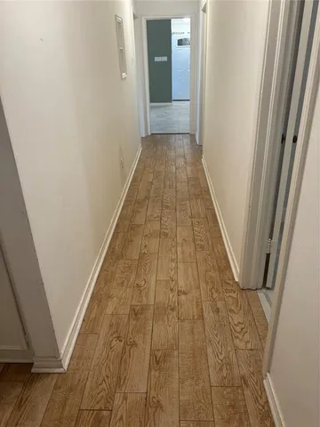 a view of hallway with stairs