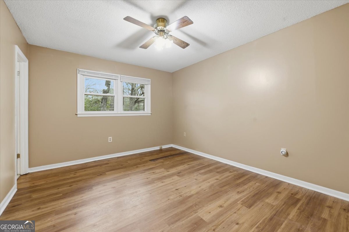 223 Randy Circle Warner Robins, GA 31088 - Photo 19 of 27 a view of an empty room with a window