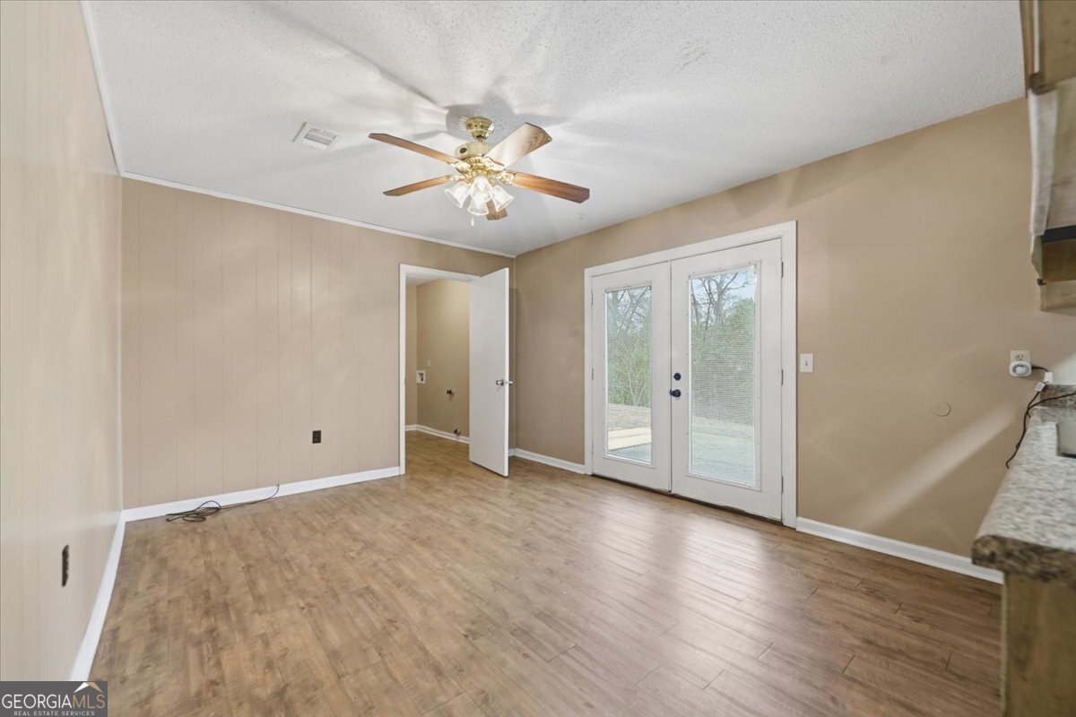 223 Randy Circle Warner Robins, GA 31088 - Photo 5 of 27 a view of an empty room with a window