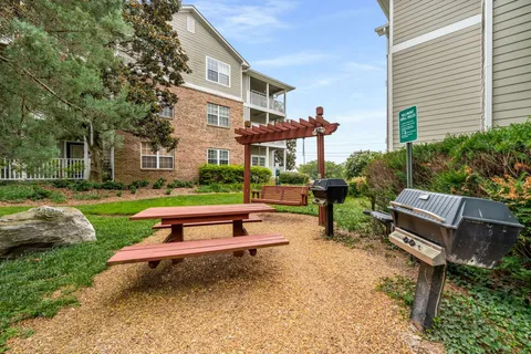 a view of a bench in a yard
