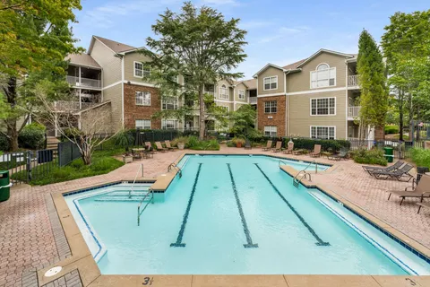 a view of a house with swimming pool