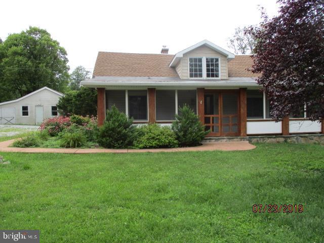 24837 Pen Mar Road Cascade, MD 21719 - Photo 4 of 32 a front view of house with yard and green space