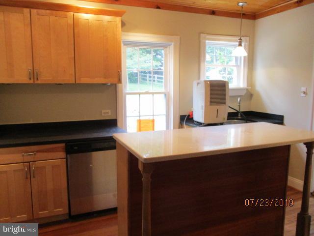 24837 Pen Mar Road Cascade, MD 21719 - Photo 5 of 32 a kitchen with a sink cabinets and window