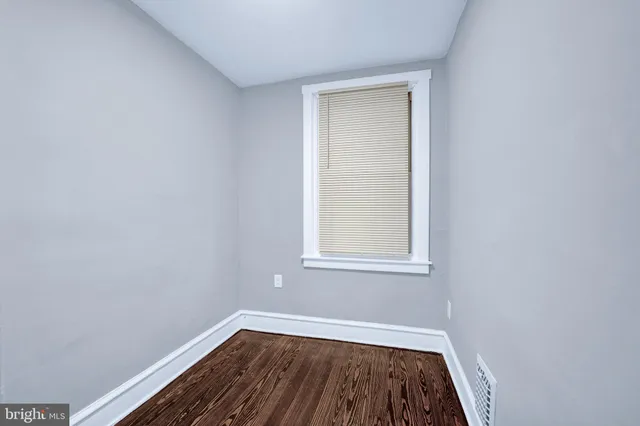 an empty room with window