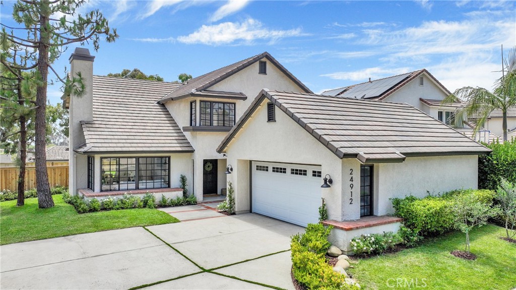 24912 Danamaple Dana Point, CA 92629 - Photo 1 of 36 a view of house with a yard and potted plants