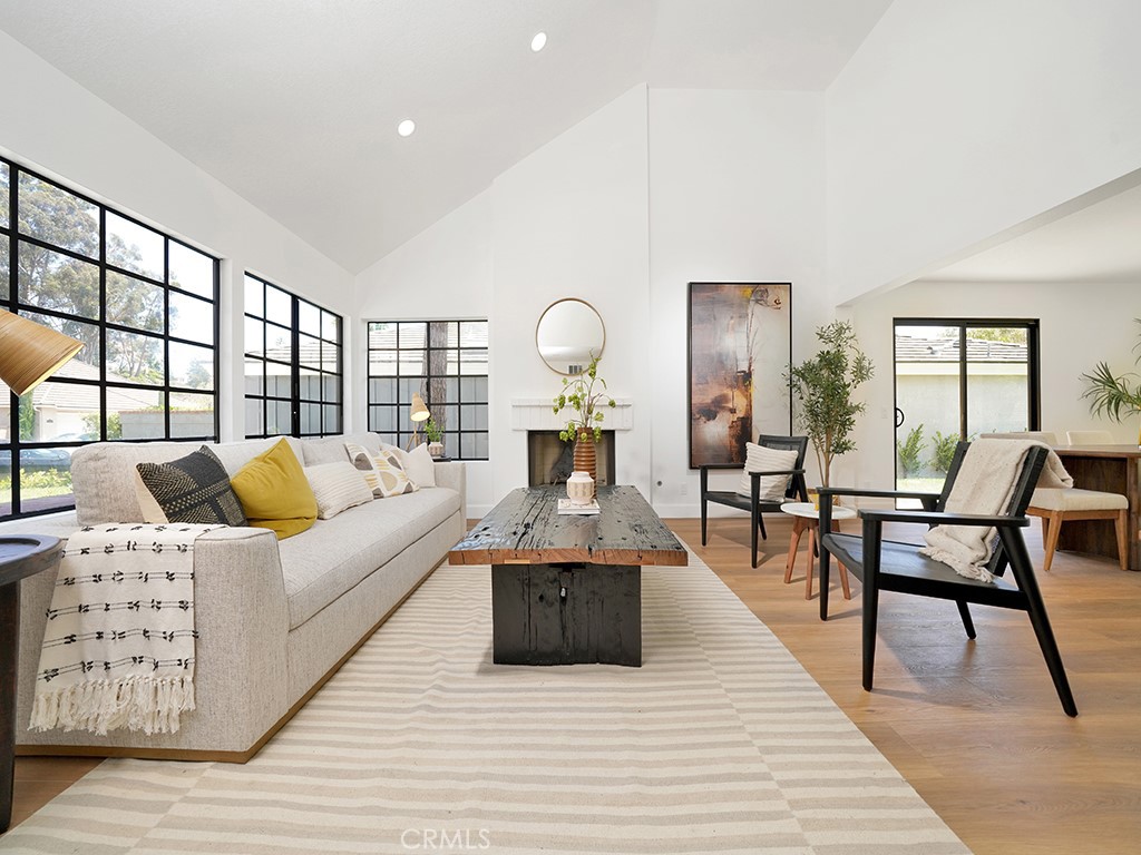 24912 Danamaple Dana Point, CA 92629 - Photo 2 of 36 a living room with furniture and a large window