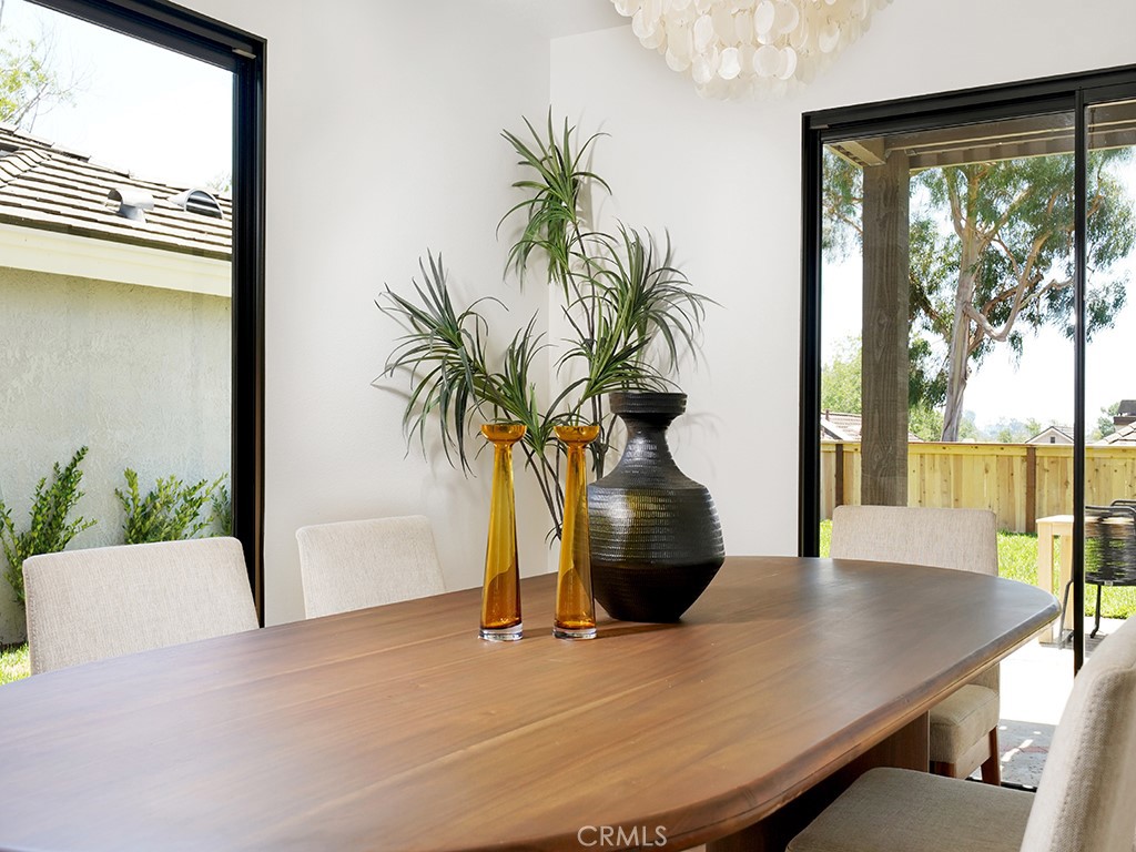 24912 Danamaple Dana Point, CA 92629 - Photo 31 of 36 a view of a living room with a floor to ceiling window and wooden floor