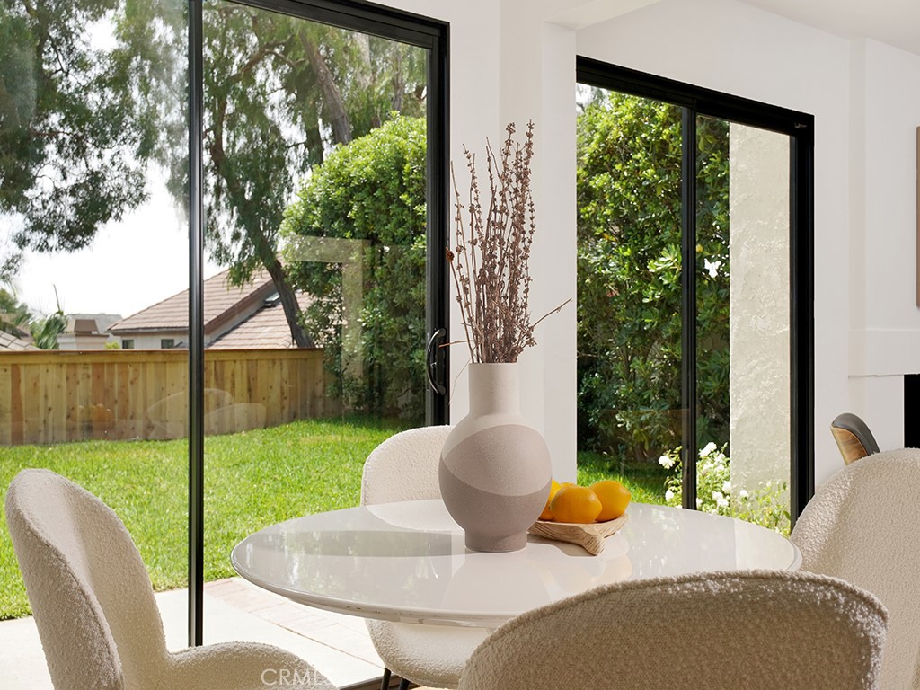 24912 Danamaple Dana Point, CA 92629 - Photo 33 of 36 a balcony with couple of chairs and potted plants