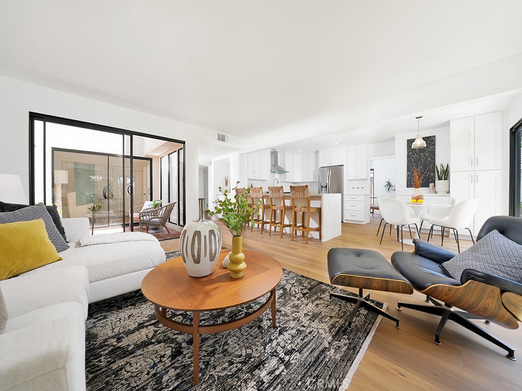 24912 Danamaple Dana Point, CA 92629 - Photo 4 of 36 a living room with furniture and a table